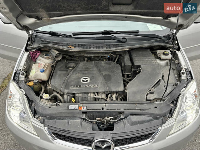 Серый Мазда 5, объемом двигателя 2 л и пробегом 211 тыс. км за 5680 $, фото 12 на Automoto.ua