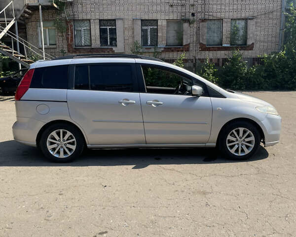 Серый Мазда 5, объемом двигателя 2 л и пробегом 311 тыс. км за 4399 $, фото 5 на Automoto.ua