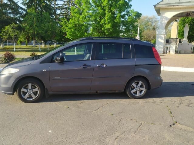 Серый Мазда 5, объемом двигателя 2 л и пробегом 160 тыс. км за 4500 $, фото 1 на Automoto.ua