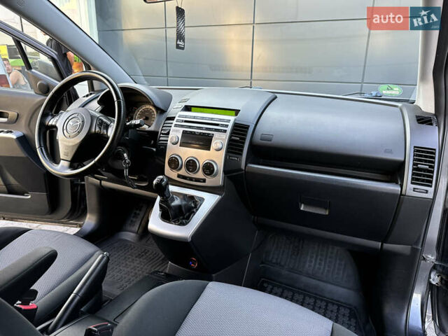 Серый Мазда 5, объемом двигателя 2 л и пробегом 256 тыс. км за 5599 $, фото 77 на Automoto.ua