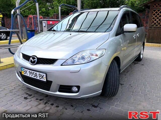Серый Мазда 5, объемом двигателя 2 л и пробегом 257 тыс. км за 6500 $, фото 1 на Automoto.ua