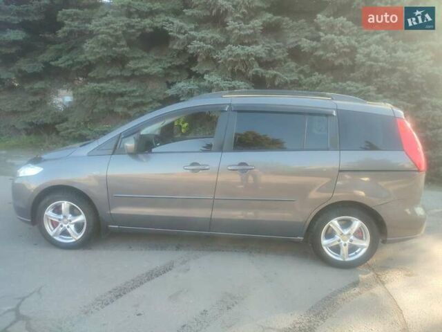 Серый Мазда 5, объемом двигателя 1.8 л и пробегом 200 тыс. км за 6200 $, фото 1 на Automoto.ua