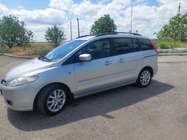 Серый Мазда 5, объемом двигателя 2 л и пробегом 340 тыс. км за 3100 $, фото 1 на Automoto.ua