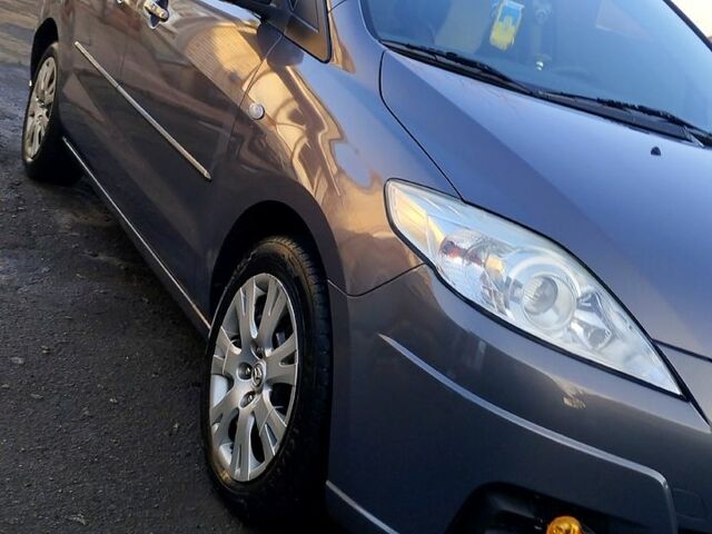 Серый Мазда 5, объемом двигателя 1.8 л и пробегом 255 тыс. км за 6500 $, фото 1 на Automoto.ua