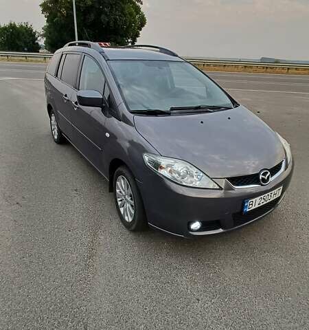 Серый Мазда 5, объемом двигателя 2 л и пробегом 184 тыс. км за 5500 $, фото 5 на Automoto.ua