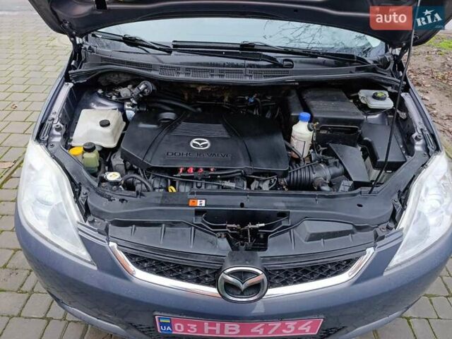 Серый Мазда 5, объемом двигателя 1.8 л и пробегом 235 тыс. км за 6700 $, фото 19 на Automoto.ua