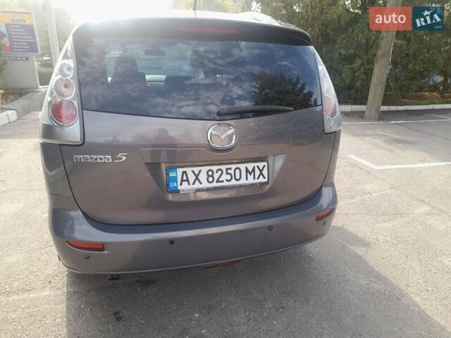 Серый Мазда 5, объемом двигателя 2 л и пробегом 226 тыс. км за 6500 $, фото 1 на Automoto.ua