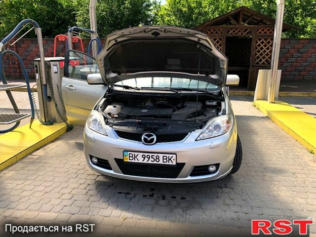 Серый Мазда 5, объемом двигателя 2 л и пробегом 257 тыс. км за 6500 $, фото 5 на Automoto.ua