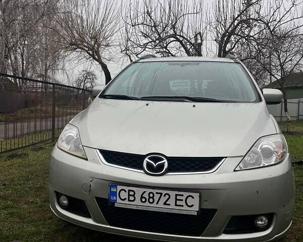 Серый Мазда 5, объемом двигателя 2 л и пробегом 414 тыс. км за 3700 $, фото 3 на Automoto.ua