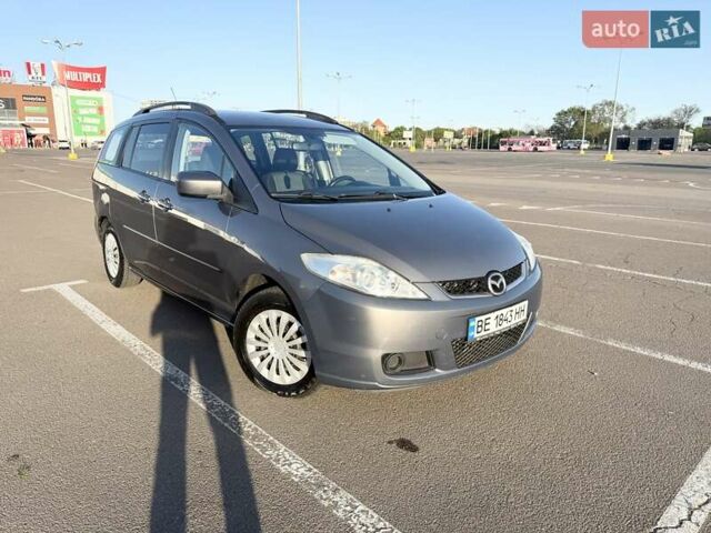 Серый Мазда 5, объемом двигателя 2 л и пробегом 233 тыс. км за 6200 $, фото 1 на Automoto.ua