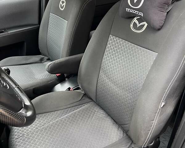 Серый Мазда 5, объемом двигателя 2 л и пробегом 244 тыс. км за 6500 $, фото 4 на Automoto.ua