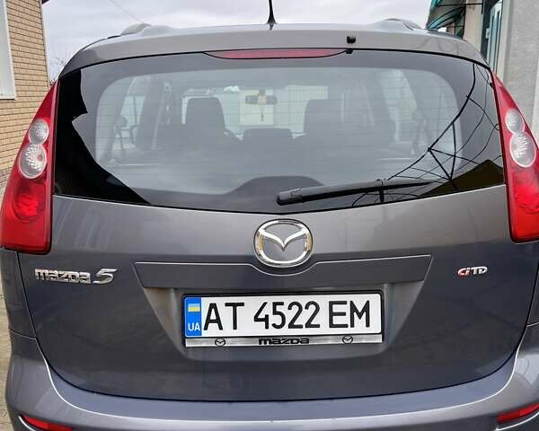 Серый Мазда 5, объемом двигателя 2 л и пробегом 244 тыс. км за 6500 $, фото 1 на Automoto.ua