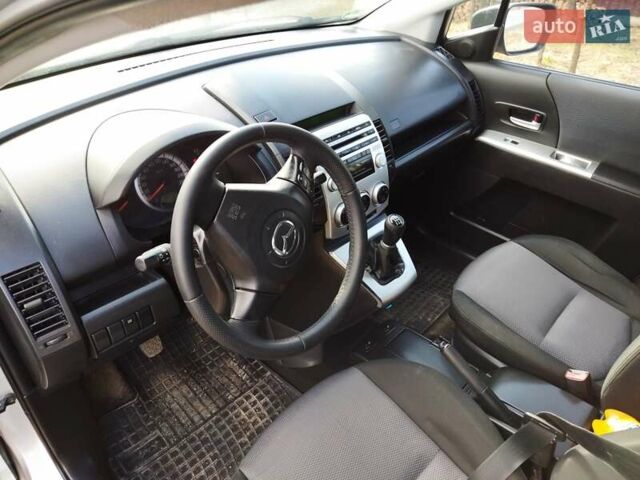 Серый Мазда 5, объемом двигателя 2 л и пробегом 222 тыс. км за 6300 $, фото 1 на Automoto.ua