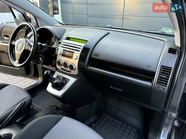 Серый Мазда 5, объемом двигателя 2 л и пробегом 256 тыс. км за 5599 $, фото 65 на Automoto.ua