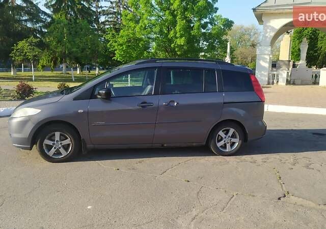 Серый Мазда 5, объемом двигателя 2 л и пробегом 260 тыс. км за 4500 $, фото 2 на Automoto.ua