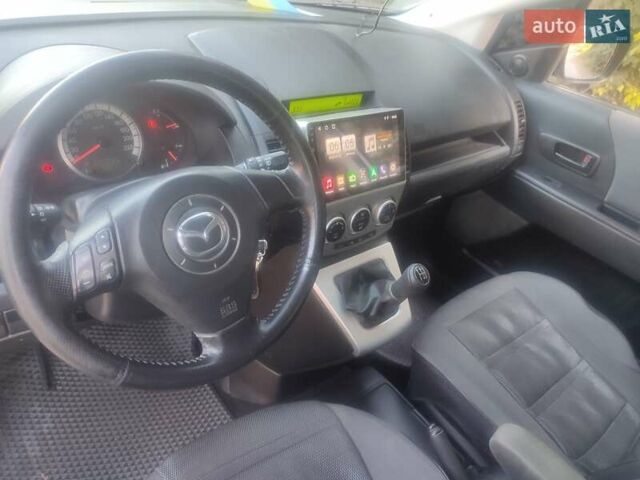 Серый Мазда 5, объемом двигателя 1.8 л и пробегом 200 тыс. км за 6200 $, фото 3 на Automoto.ua