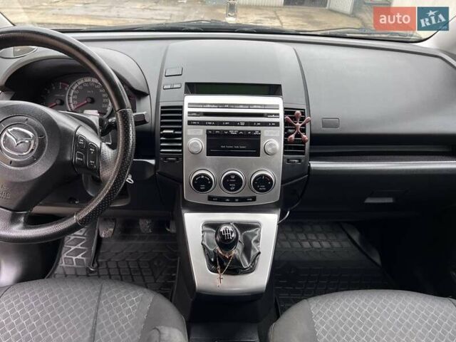 Серый Мазда 5, объемом двигателя 2 л и пробегом 244 тыс. км за 6500 $, фото 5 на Automoto.ua