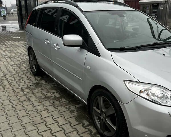 Серый Мазда 5, объемом двигателя 2 л и пробегом 377 тыс. км за 5500 $, фото 2 на Automoto.ua