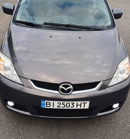 Серый Мазда 5, объемом двигателя 2 л и пробегом 184 тыс. км за 5500 $, фото 2 на Automoto.ua