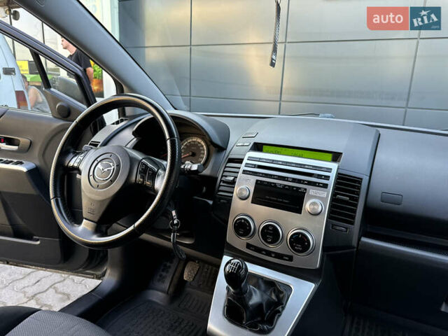Серый Мазда 5, объемом двигателя 2 л и пробегом 256 тыс. км за 5599 $, фото 66 на Automoto.ua