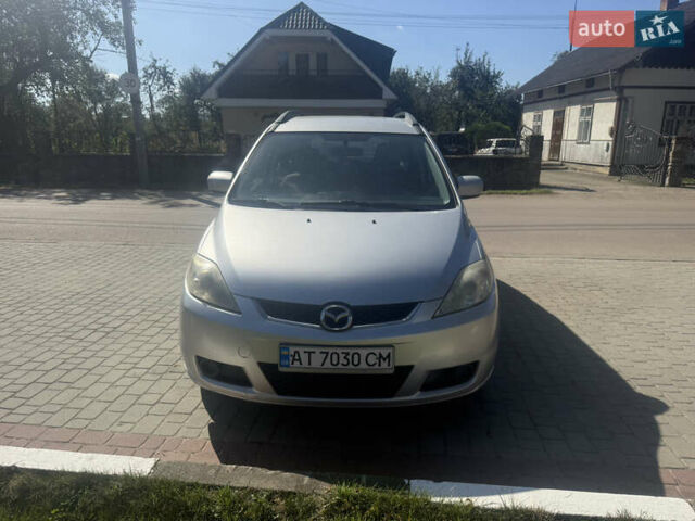Серый Мазда 5, объемом двигателя 2 л и пробегом 401 тыс. км за 4500 $, фото 1 на Automoto.ua
