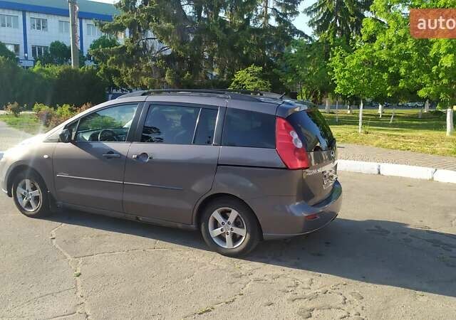Серый Мазда 5, объемом двигателя 2 л и пробегом 260 тыс. км за 4500 $, фото 1 на Automoto.ua