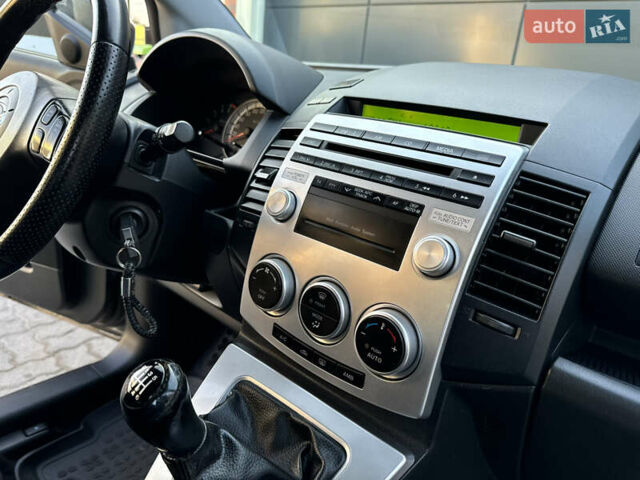 Серый Мазда 5, объемом двигателя 2 л и пробегом 256 тыс. км за 5599 $, фото 68 на Automoto.ua