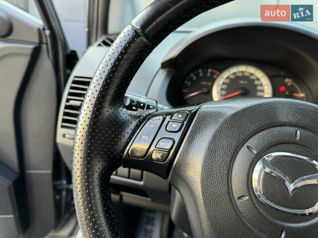 Серый Мазда 5, объемом двигателя 2 л и пробегом 256 тыс. км за 5599 $, фото 49 на Automoto.ua