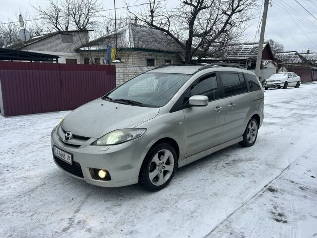 Серый Мазда 5, объемом двигателя 2 л и пробегом 231 тыс. км за 5350 $, фото 1 на Automoto.ua