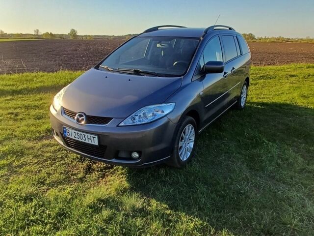 Серый Мазда 5, объемом двигателя 2 л и пробегом 195 тыс. км за 5000 $, фото 3 на Automoto.ua
