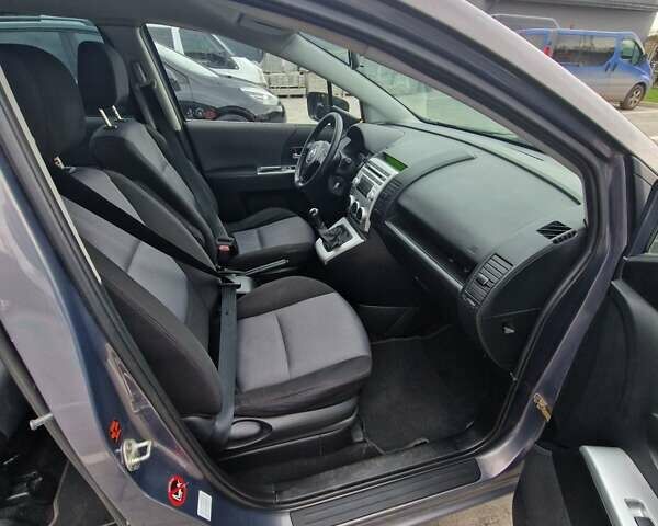 Серый Мазда 5, объемом двигателя 2 л и пробегом 332 тыс. км за 5200 $, фото 1 на Automoto.ua