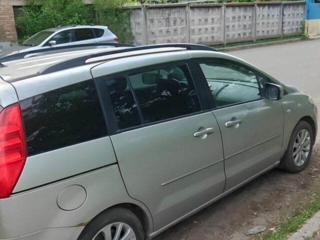 Серый Мазда 5, объемом двигателя 2 л и пробегом 160 тыс. км за 4000 $, фото 1 на Automoto.ua