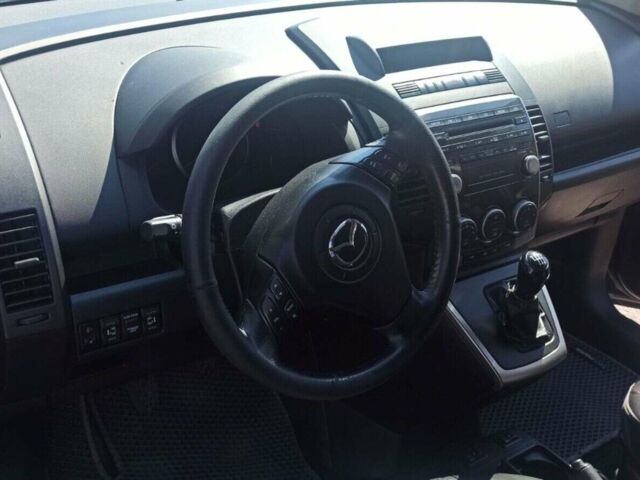 Серый Мазда 5, объемом двигателя 2 л и пробегом 208 тыс. км за 5000 $, фото 1 на Automoto.ua