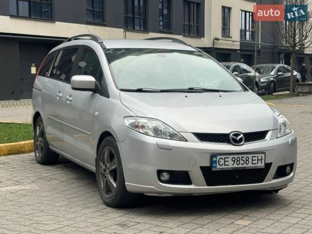 Серый Мазда 5, объемом двигателя 2 л и пробегом 378 тыс. км за 4950 $, фото 1 на Automoto.ua