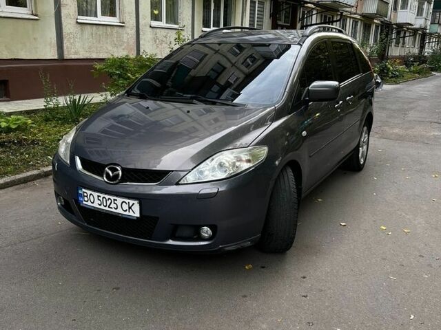 Серый Мазда 5, объемом двигателя 2 л и пробегом 307 тыс. км за 4900 $, фото 3 на Automoto.ua