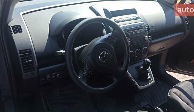 Серый Мазда 5, объемом двигателя 2 л и пробегом 208 тыс. км за 6000 $, фото 2 на Automoto.ua