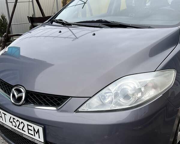 Серый Мазда 5, объемом двигателя 2 л и пробегом 244 тыс. км за 6500 $, фото 2 на Automoto.ua