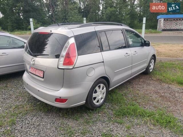 Серый Мазда 5, объемом двигателя 1.8 л и пробегом 221 тыс. км за 6200 $, фото 1 на Automoto.ua