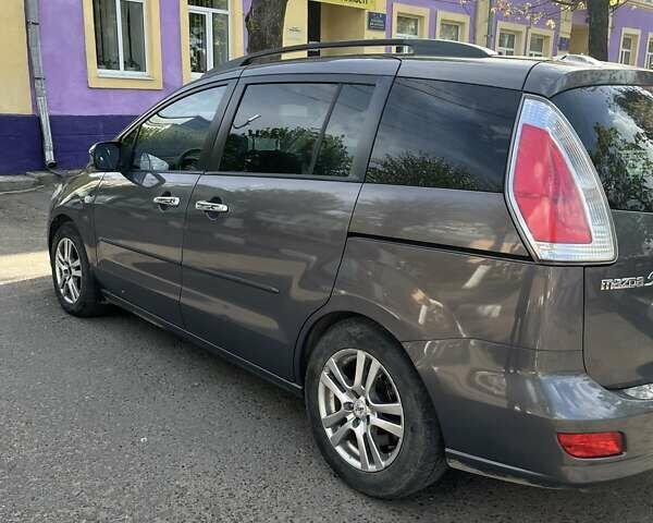 Серый Мазда 5, объемом двигателя 2 л и пробегом 236 тыс. км за 8038 $, фото 3 на Automoto.ua