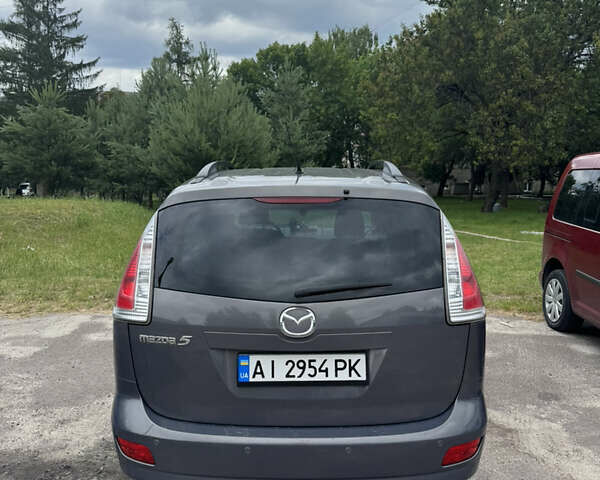 Серый Мазда 5, объемом двигателя 2 л и пробегом 222 тыс. км за 6399 $, фото 1 на Automoto.ua