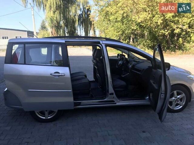 Серый Мазда 5, объемом двигателя 2 л и пробегом 235 тыс. км за 6350 $, фото 26 на Automoto.ua