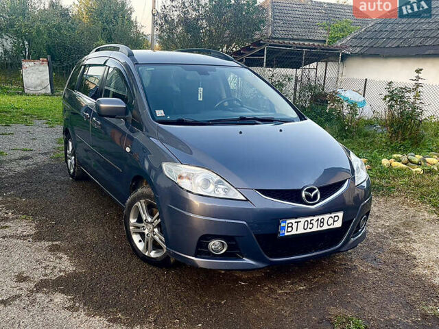 Серый Мазда 5, объемом двигателя 2 л и пробегом 350 тыс. км за 5900 $, фото 27 на Automoto.ua