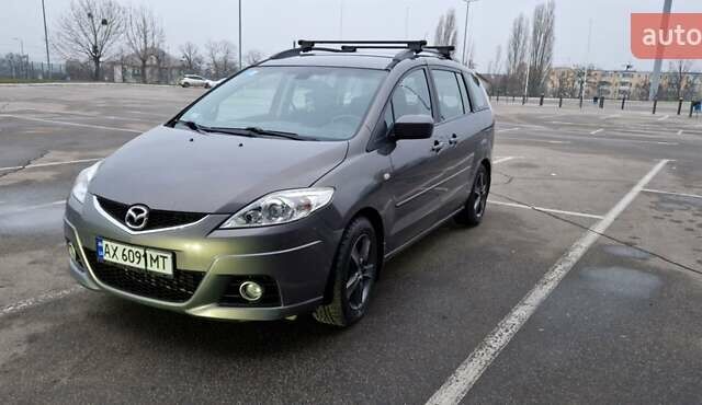 Серый Мазда 5, объемом двигателя 2 л и пробегом 290 тыс. км за 6474 $, фото 4 на Automoto.ua