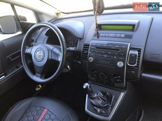 Серый Мазда 5, объемом двигателя 2 л и пробегом 235 тыс. км за 6350 $, фото 23 на Automoto.ua