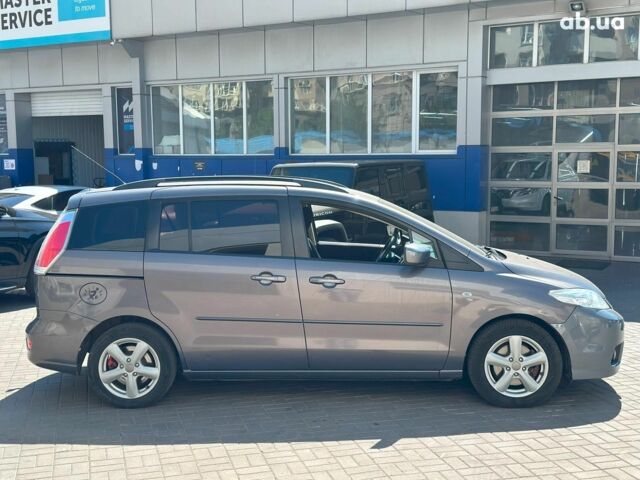 Серый Мазда 5, объемом двигателя 2 л и пробегом 317 тыс. км за 6990 $, фото 4 на Automoto.ua