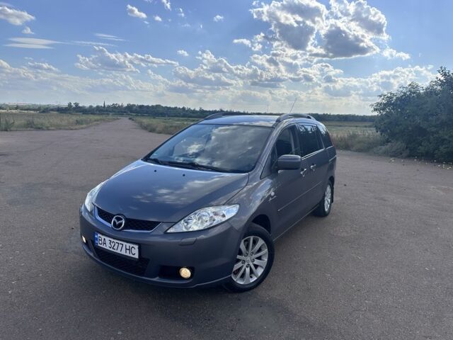 Серый Мазда 5, объемом двигателя 2 л и пробегом 253 тыс. км за 4662 $, фото 1 на Automoto.ua