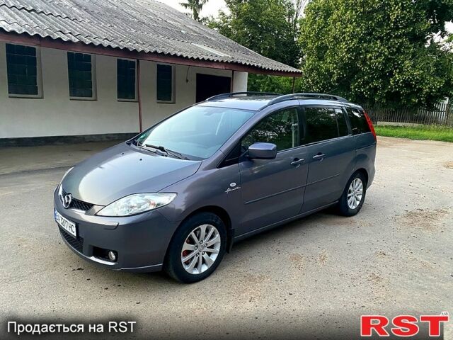 Серый Мазда 5, объемом двигателя 2 л и пробегом 210 тыс. км за 4600 $, фото 10 на Automoto.ua