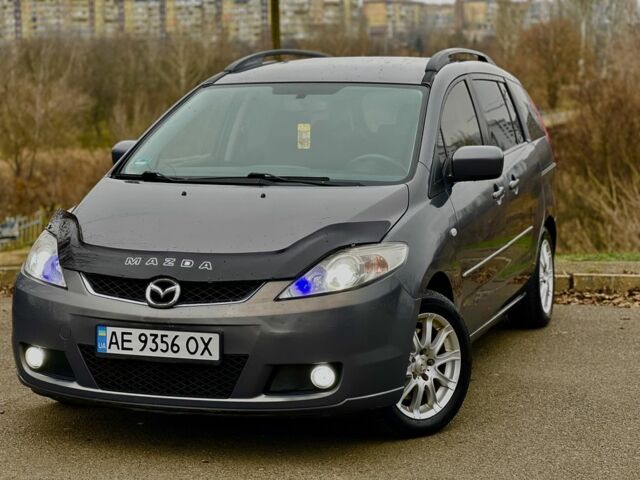 Серый Мазда 5, объемом двигателя 2 л и пробегом 200 тыс. км за 5999 $, фото 1 на Automoto.ua