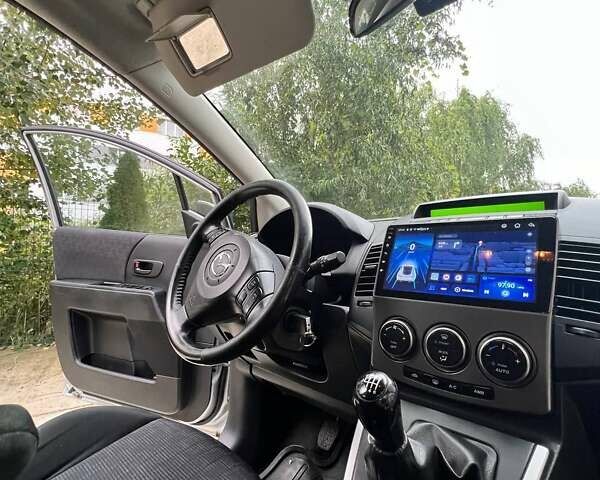 Серый Мазда 5, объемом двигателя 2 л и пробегом 273 тыс. км за 5200 $, фото 2 на Automoto.ua