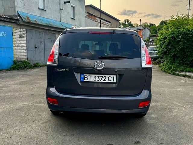 Серый Мазда 5, объемом двигателя 2 л и пробегом 261 тыс. км за 6800 $, фото 1 на Automoto.ua